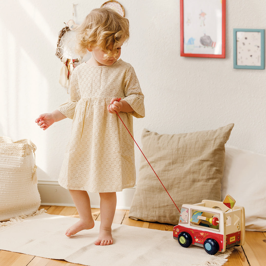 Friends on Tour Pull Along Toy lifestyle image with child