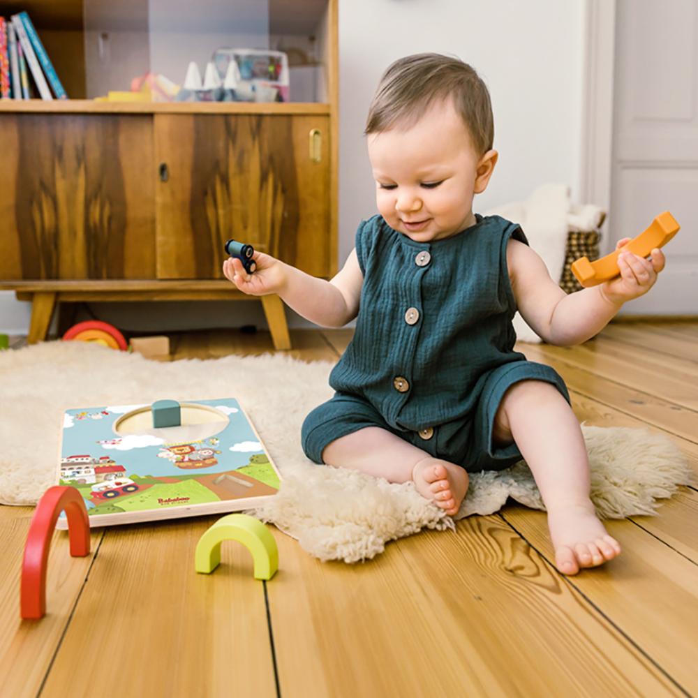 Drive Through the Rainbow Puzzle Game lifestyle image with child